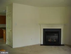 a room with a fireplace