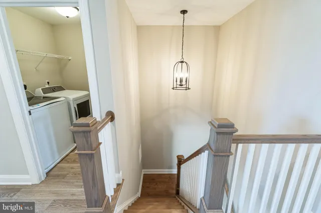 a view of a storage & utility room with a sink
