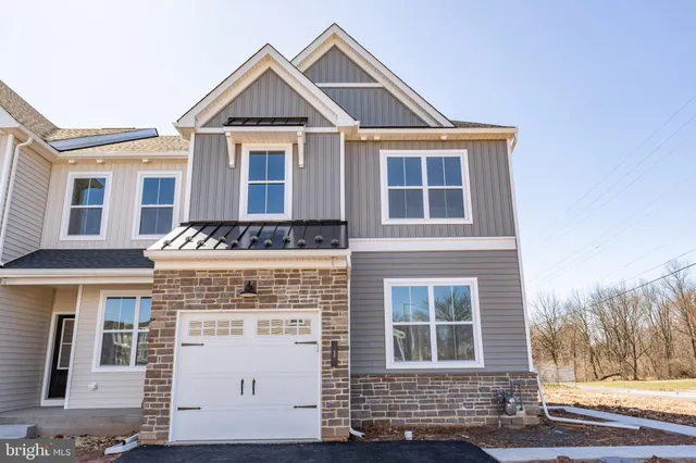 a front view of a house with a entrance