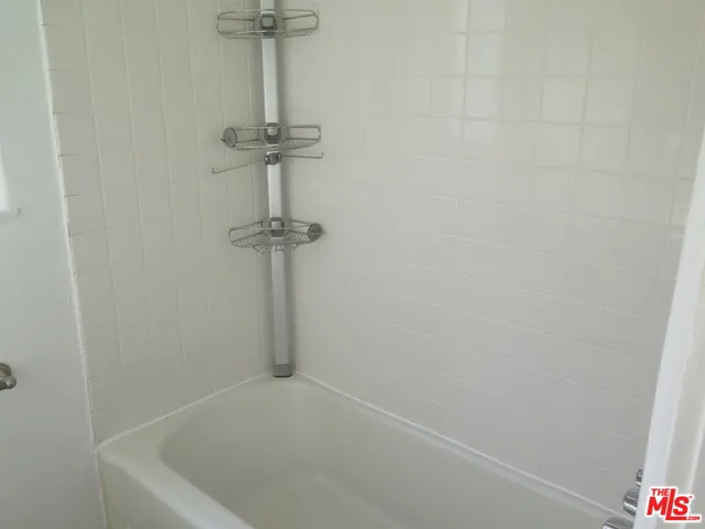 a view of a backyard with a patio