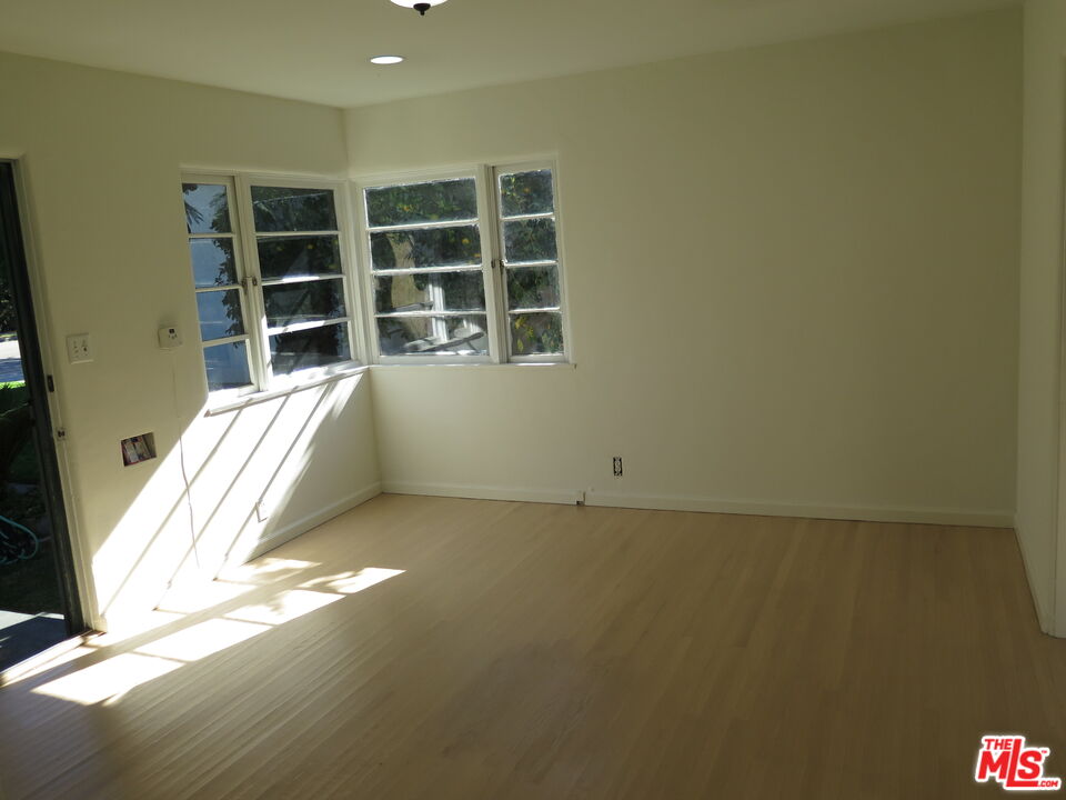 2128 20th Street, Unit B Santa Monica, CA 90405 - Photo 5 of 22 a view of an empty room with a window