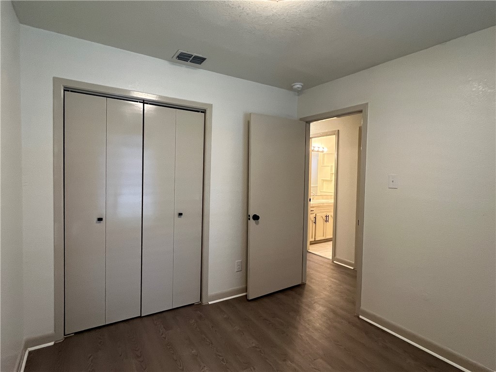 2930 River Crest Road Corpus Christi, TX 78415 - Photo 26 of 27 a view of a hallway with wooden floor