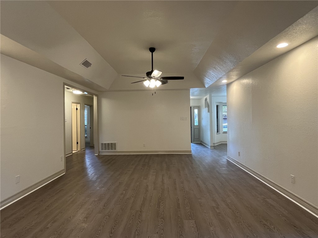 2930 River Crest Road Corpus Christi, TX 78415 - Photo 3 of 27 wooden floor in an empty room with a window