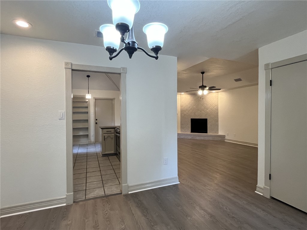 2930 River Crest Road Corpus Christi, TX 78415 - Photo 8 of 27 wooden floor in an empty room with a mirror