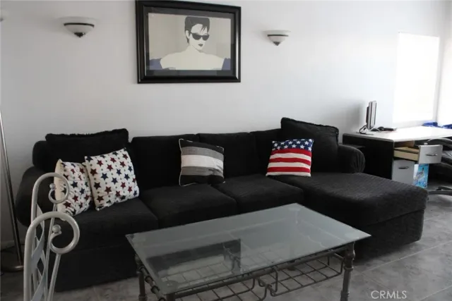 a living room with furniture and a couch