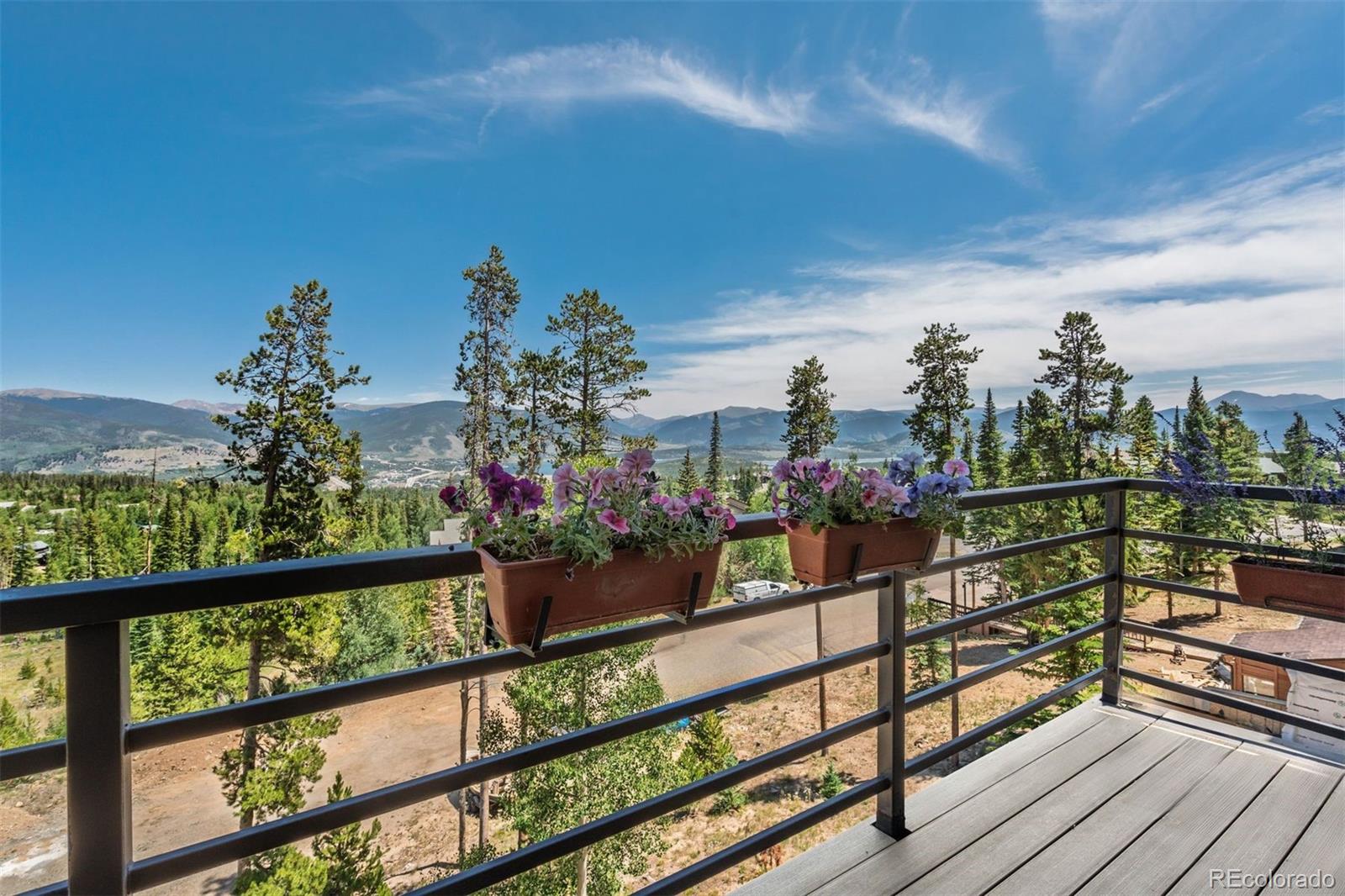 89310 Ryan Gulch Road, Unit 403 Silverthorne, CO 80498 - Photo 2 of 40 a view of a balcony with city view