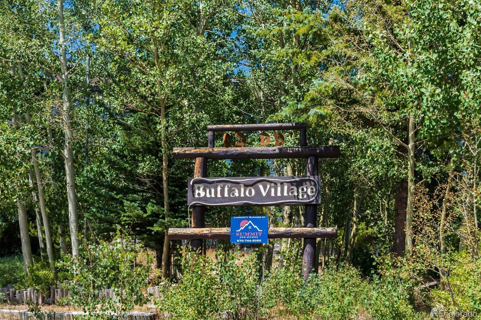 89310 Ryan Gulch Road, Unit 403 Silverthorne, CO 80498 - Photo 36 of 40 a sign that is sitting on a pole