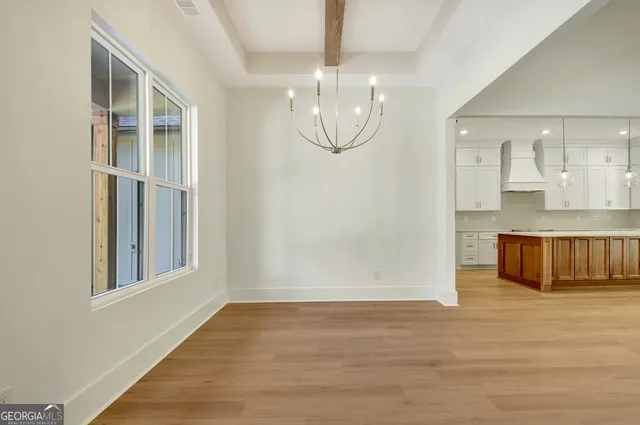 a bathroom with a sink and shower