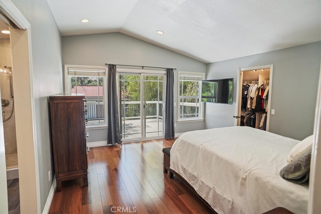 27763 Wakefield Road Castaic, CA 91384 - Photo 19 of 39 a spacious bedroom with a bed and wooden floor