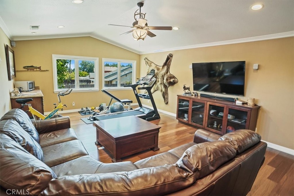 27763 Wakefield Road Castaic, CA 91384 - Photo 24 of 39 a living room with furniture and a flat screen tv