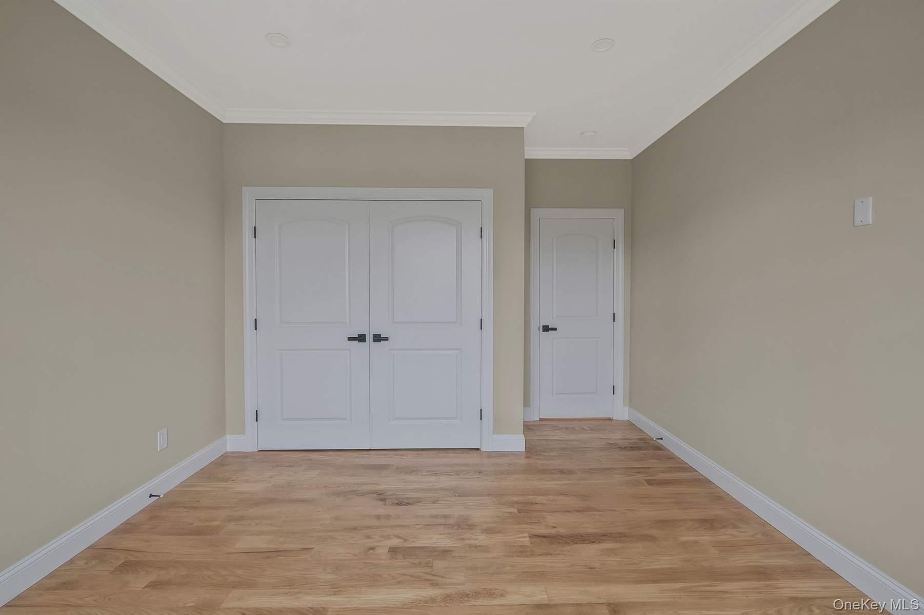 457 Pond Path East Setauket, NY 11733 - Photo 24 of 47 a view of an empty room