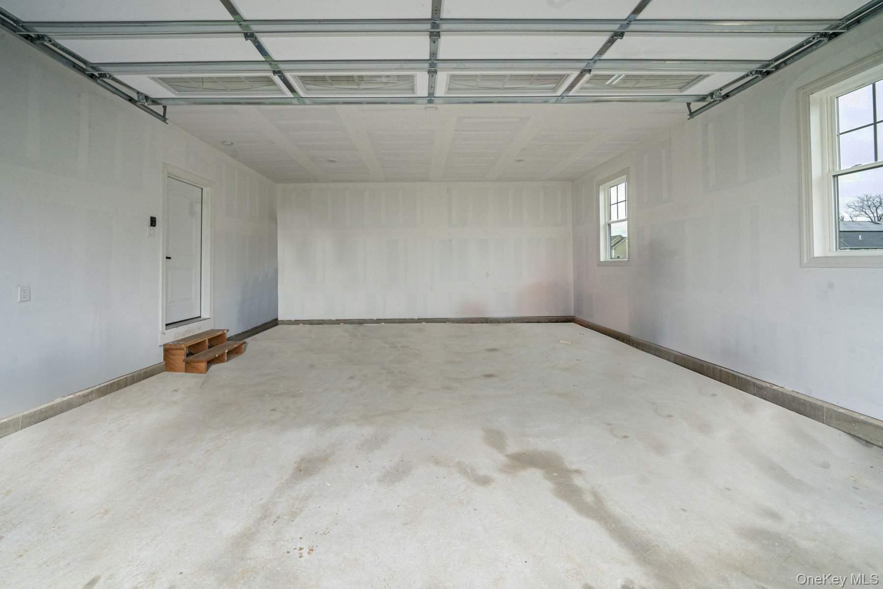 457 Pond Path East Setauket, NY 11733 - Photo 36 of 47 a view of a room with rack and windows
