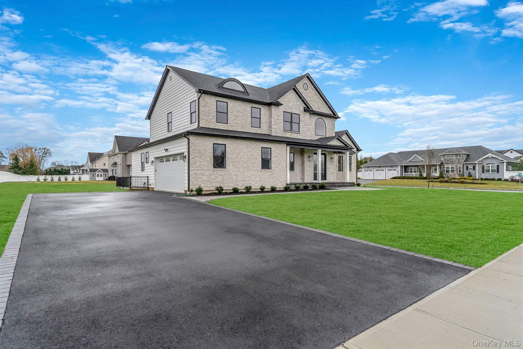 457 Pond Path East Setauket, NY 11733 - Photo 41 of 47 a view of a house with a big yard