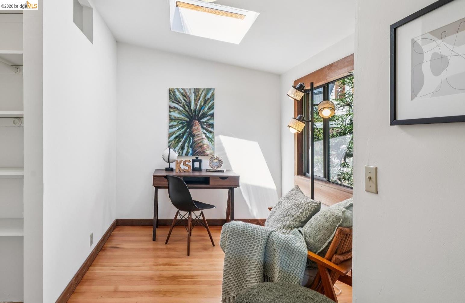 813 San Diego Road Berkeley, CA 94707 - Photo 48 of 60 a living room with furniture and a potted plant