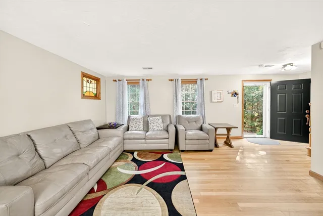 a living room with furniture and a couch