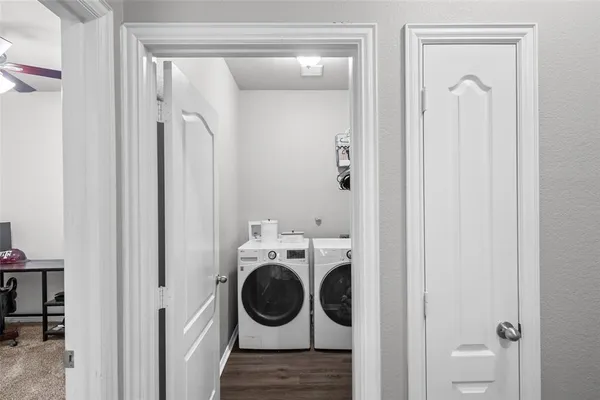 a utility room with dryer and washer