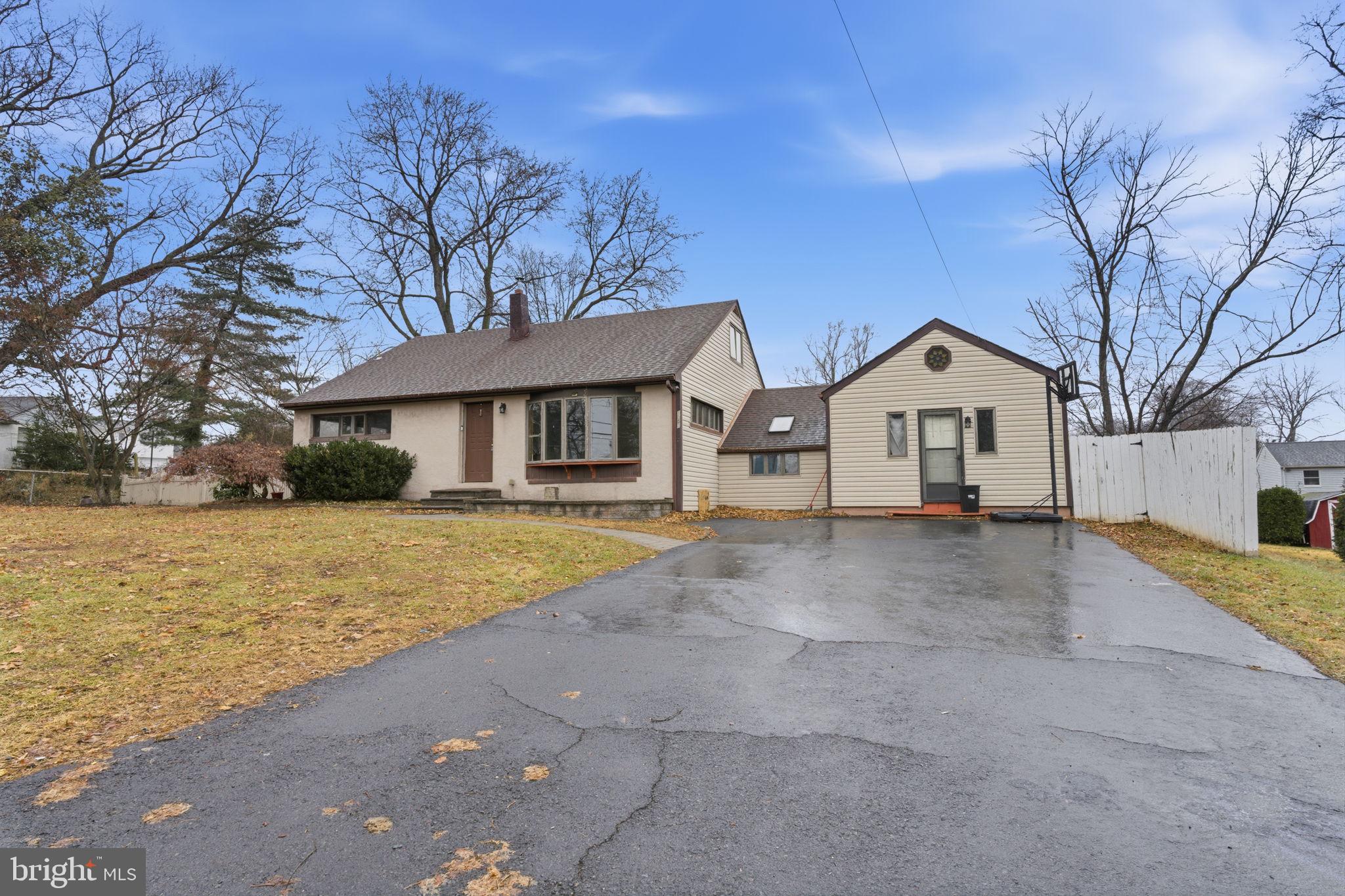 1057 Bridge Road Bensalem, PA 19020 - Photo 1 of 37 a view of house with outdoor space and street view
