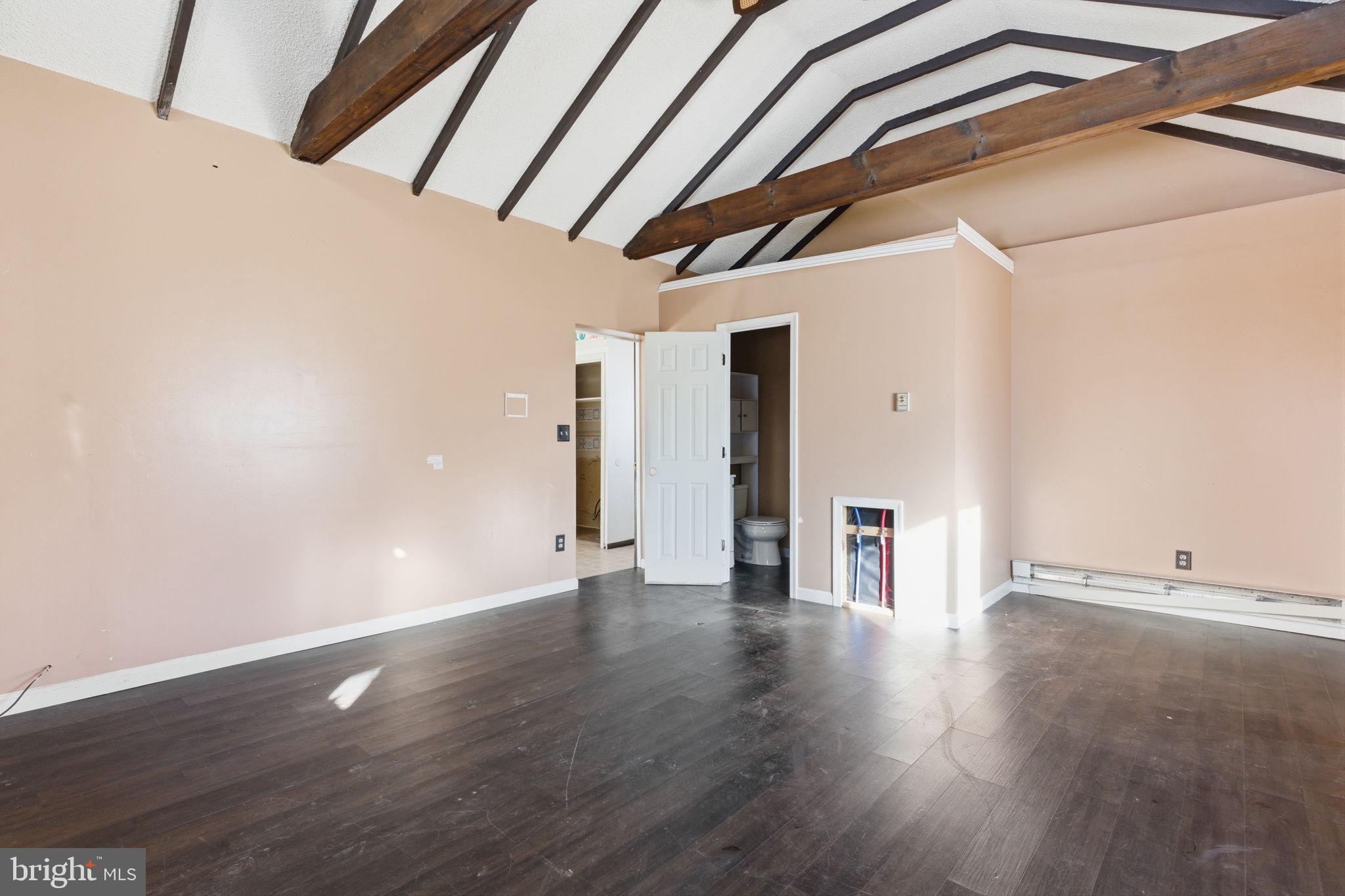 1057 Bridge Road Bensalem, PA 19020 - Photo 17 of 37 a view of an empty room with wooden floor