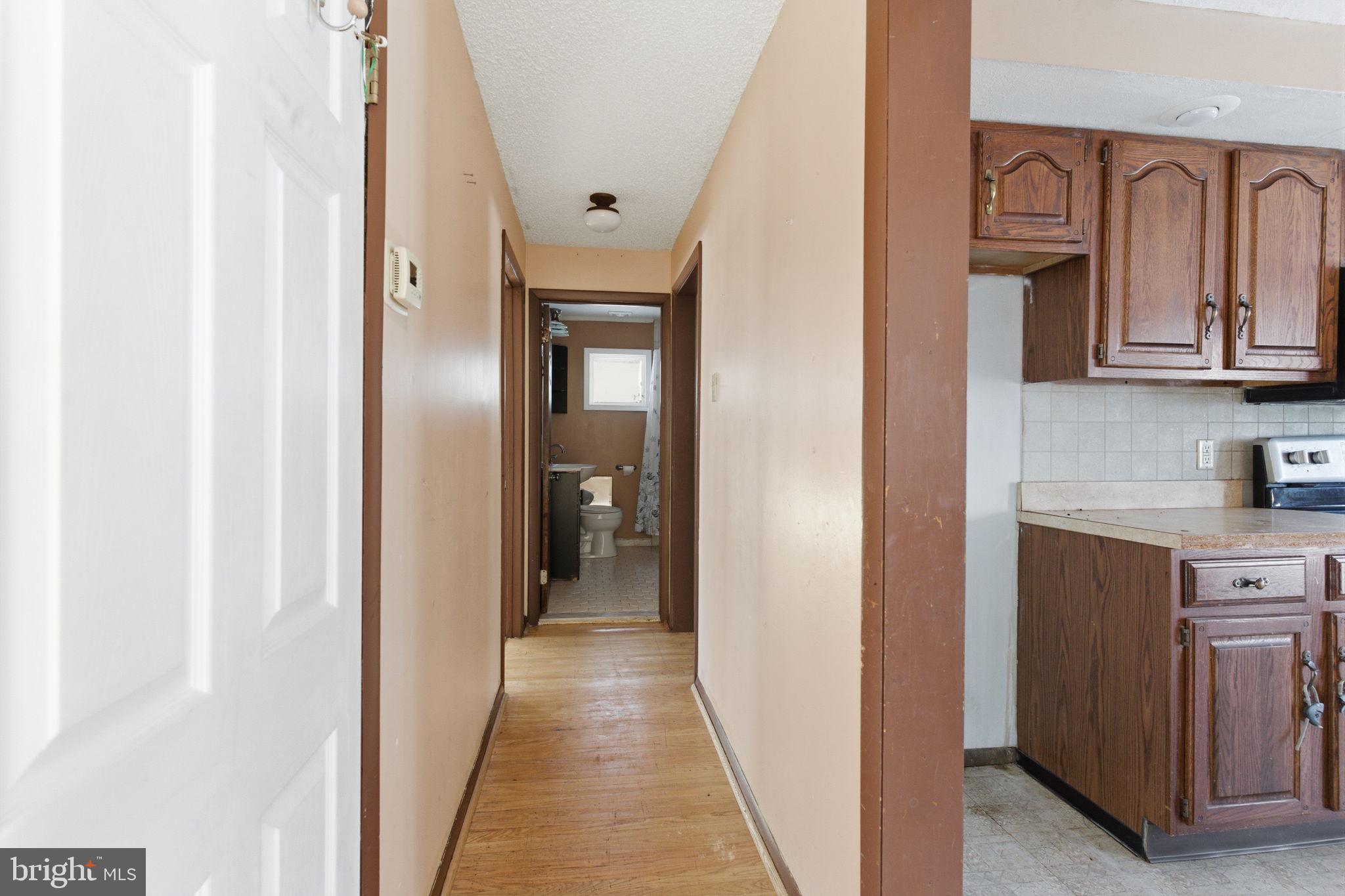 1057 Bridge Road Bensalem, PA 19020 - Photo 20 of 37 a view of a kitchen from the hallway