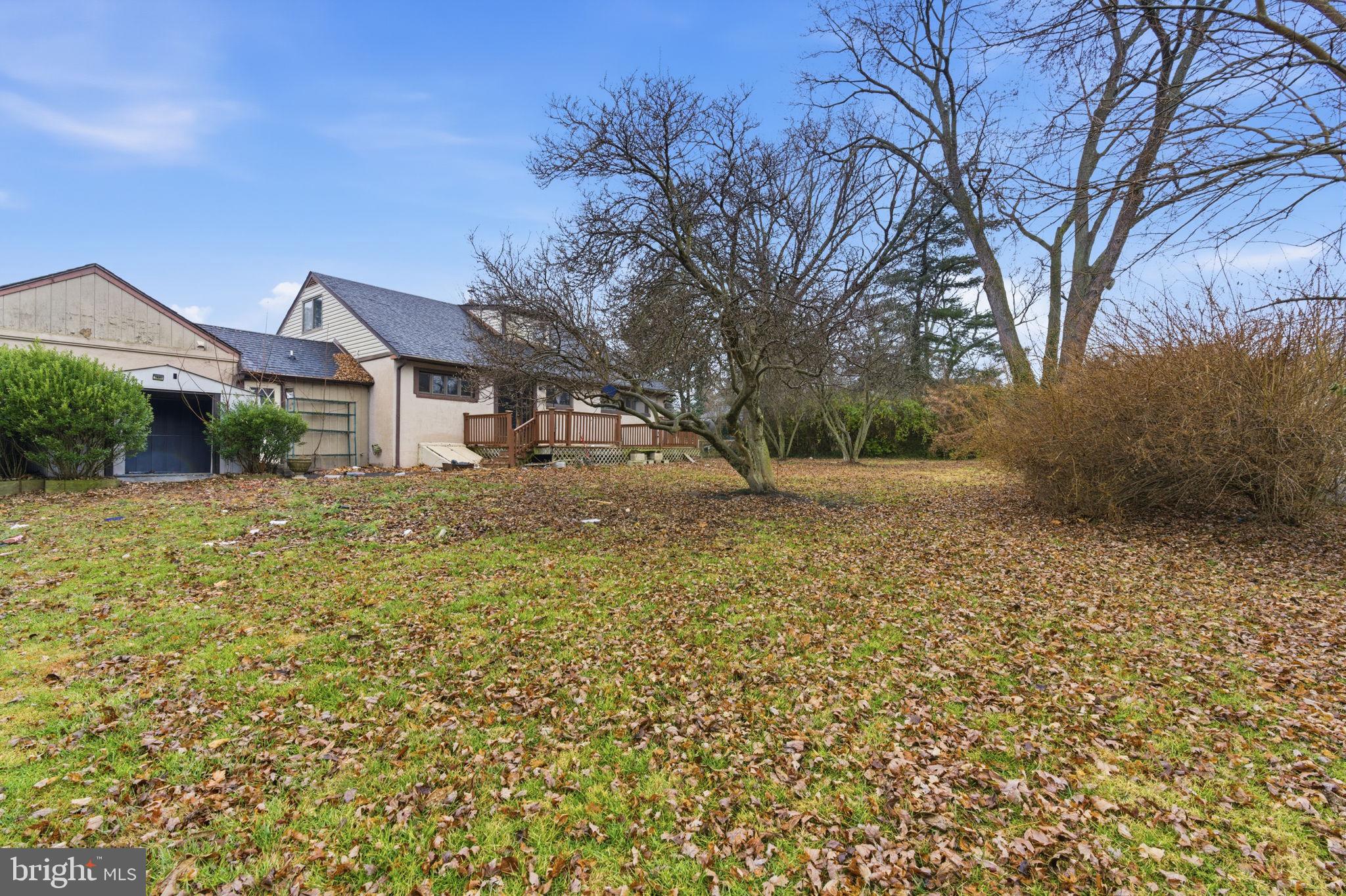 1057 Bridge Road Bensalem, PA 19020 - Photo 35 of 37 a front view of a house with a yard
