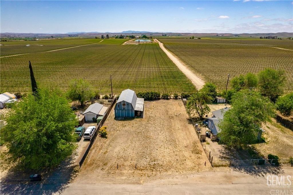 a view of swimming pool with a lounge chair