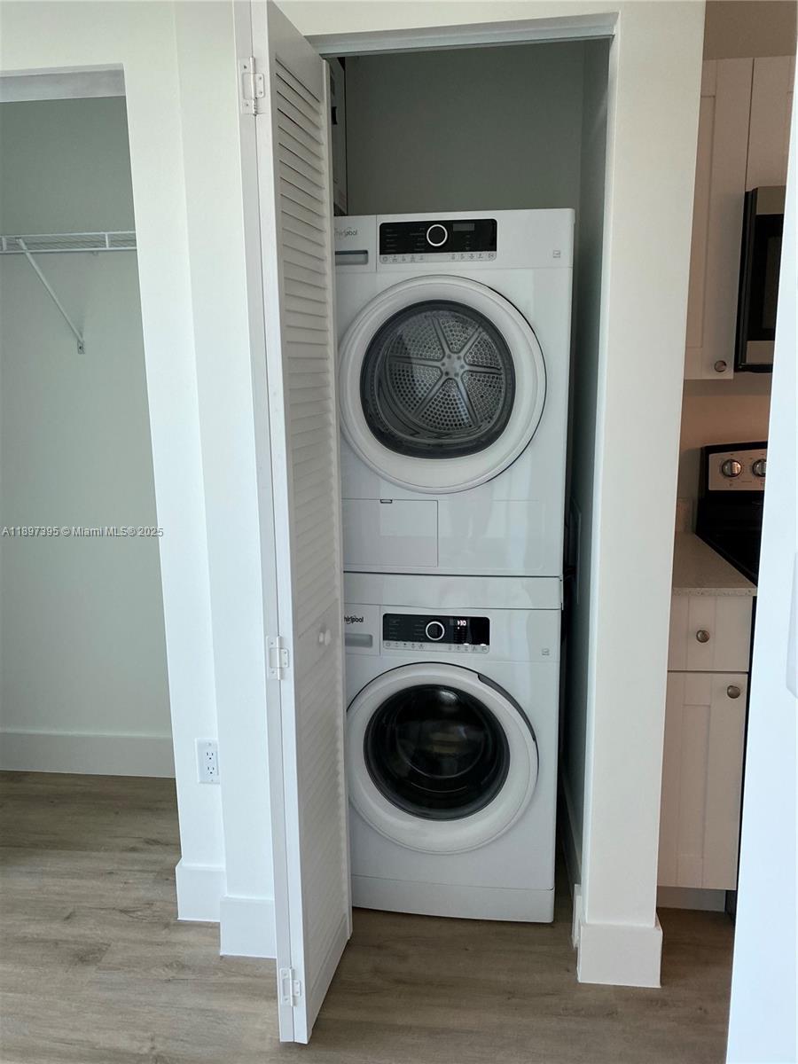 4100 Southwest 64th Avenue, Unit 314 Davie, FL 33314 - Photo 5 of 17 a utility room with dryer and washer