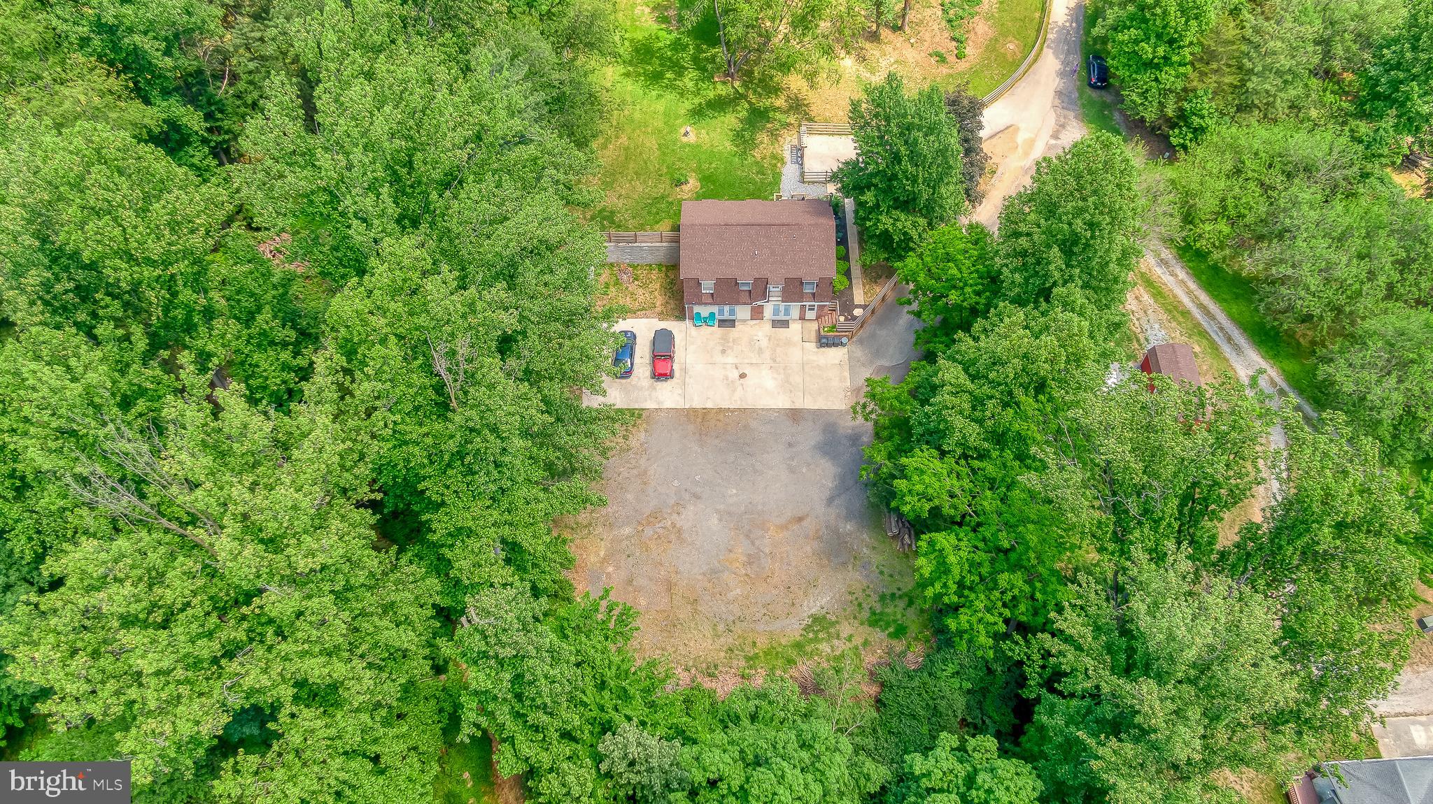 305 Crowl Road Westminster, MD 21158 - Photo 39 of 55 an aerial view of a house with a yard and garden