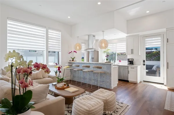 a room with furniture and a large window