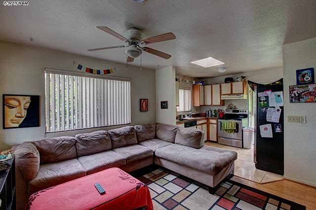 104 Cooke Road Kula, HI 96790 - Photo 19 of 22 a living room with furniture and a window