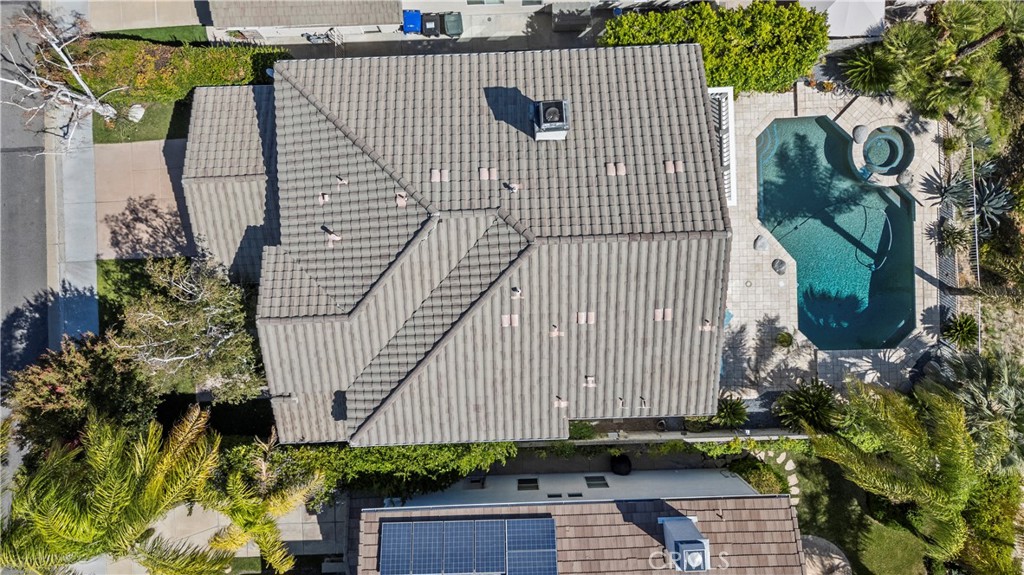 25512 Wilde Avenue Stevenson Ranch, CA 91381 - Photo 27 of 53 a view of a brick wall with a building in the background