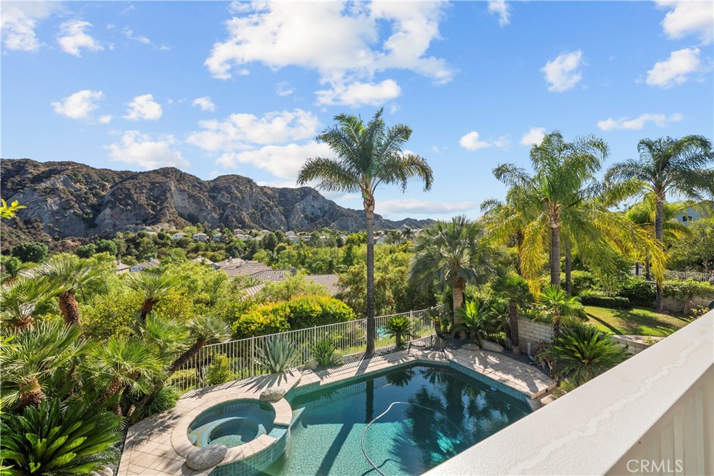 25512 Wilde Avenue Stevenson Ranch, CA 91381 - Photo 42 of 53 a view of a lake from a balcony
