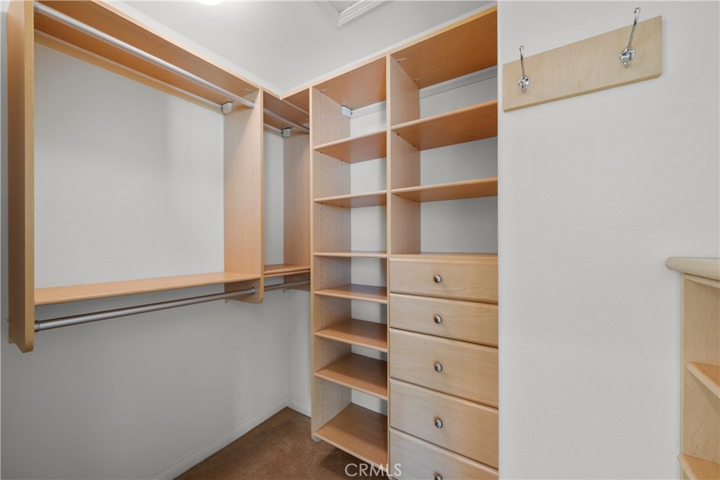 25512 Wilde Avenue Stevenson Ranch, CA 91381 - Photo 47 of 53 a view of walk in closet with empty racks