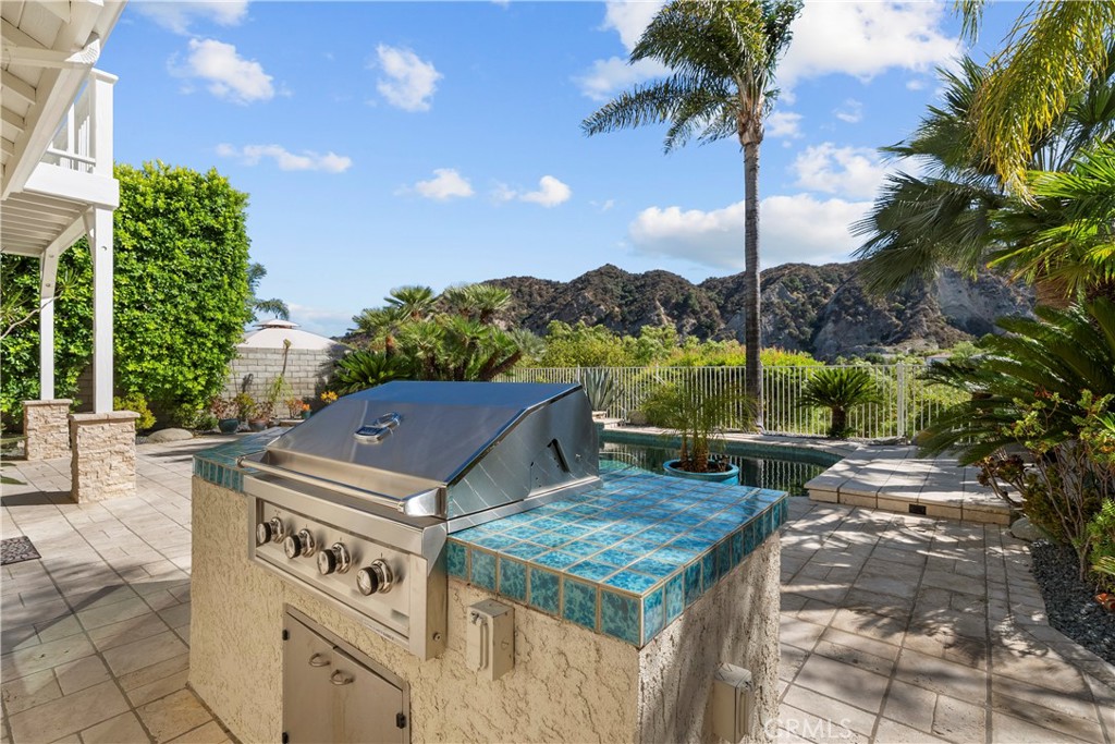 25512 Wilde Avenue Stevenson Ranch, CA 91381 - Photo 8 of 53 a view of a terrace with furniture