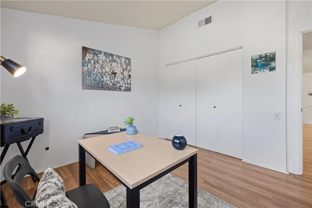 a room with furniture and wooden floor