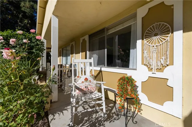 front view of a house with a fountain