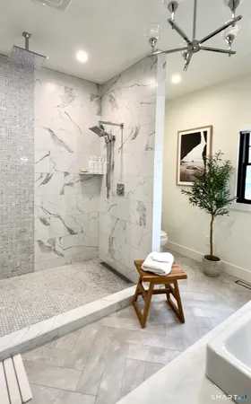 a living room with a couch and a table