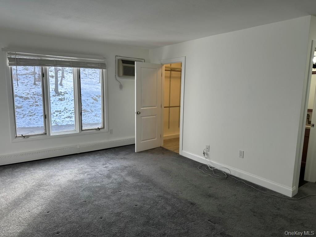 3 Hook Road, Unit 72K Poughkeepsie, NY 12601 - Photo 11 of 13 Primary bedroom with half bath and walk in closet
