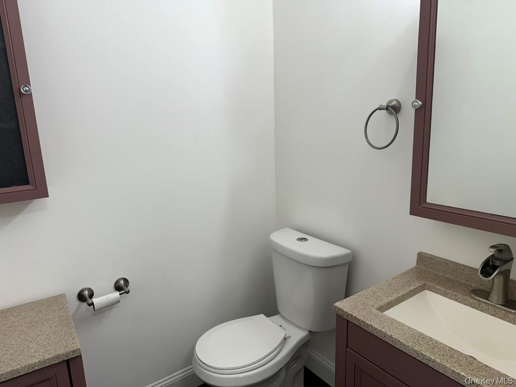 3 Hook Road, Unit 72K Poughkeepsie, NY 12601 - Photo 7 of 13 Bathroom featuring vanity and toilet