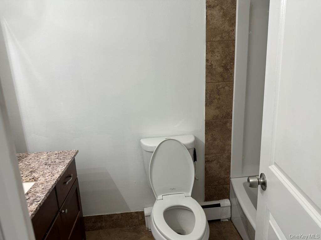 3 Hook Road, Unit 72K Poughkeepsie, NY 12601 - Photo 8 of 13 Bathroom with vanity and a bathtub