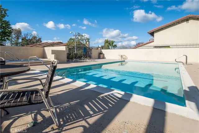 a view of a brick building with many windows