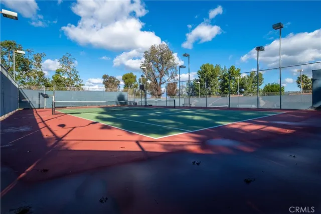 a view of a golf course with a big yard