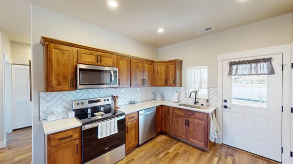 an aerial view of a house with a ocean view