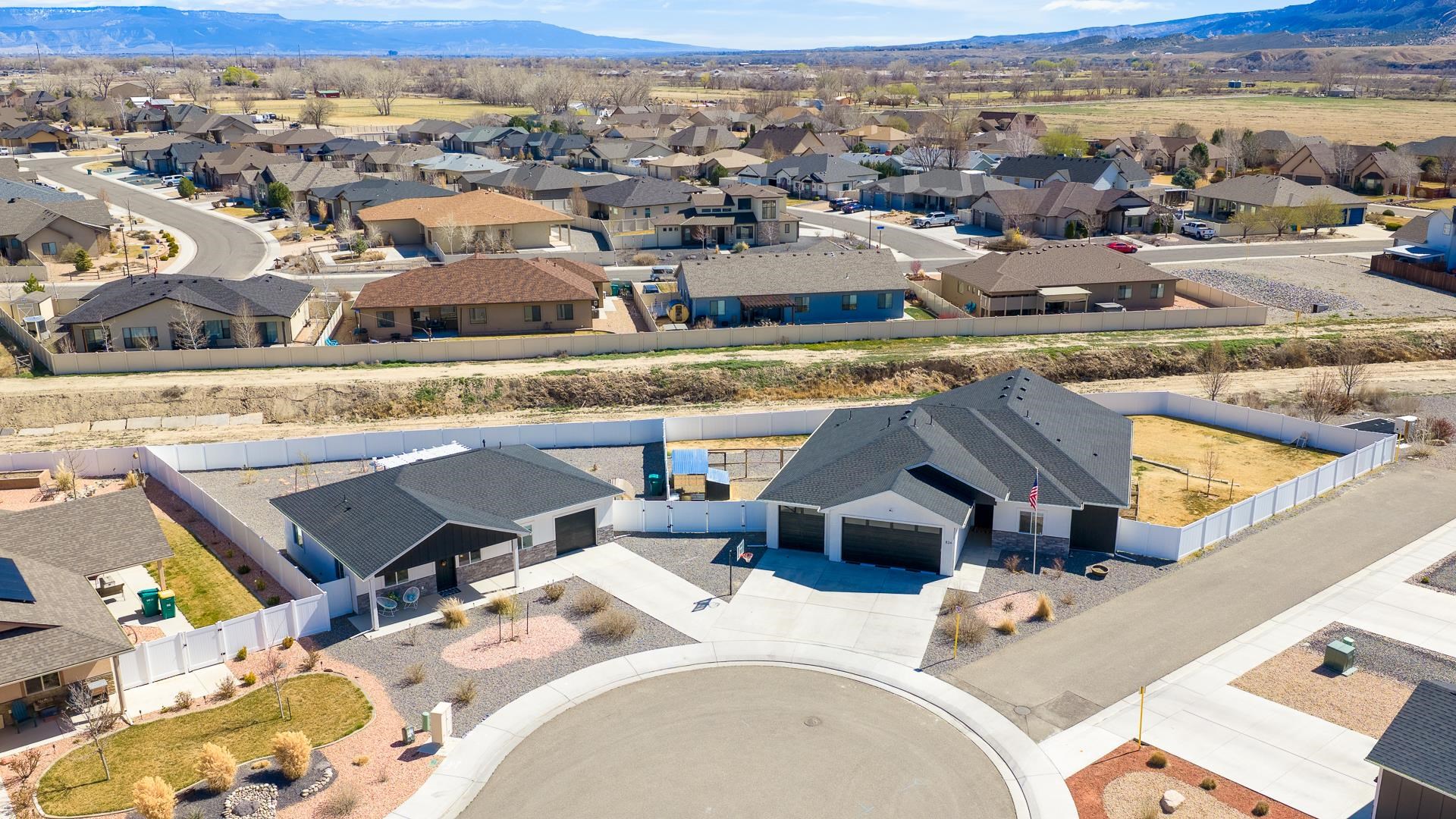834 Adams Drive Fruita, CO 81521 - Photo 40 of 42 an aerial view of a house with a ocean view