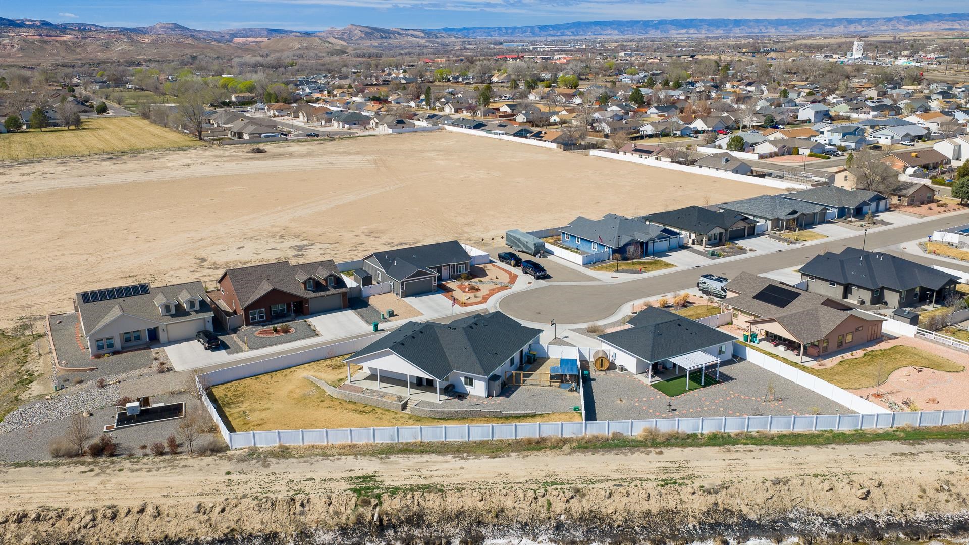 834 Adams Drive Fruita, CO 81521 - Photo 41 of 42 an aerial view of residential houses with outdoor space