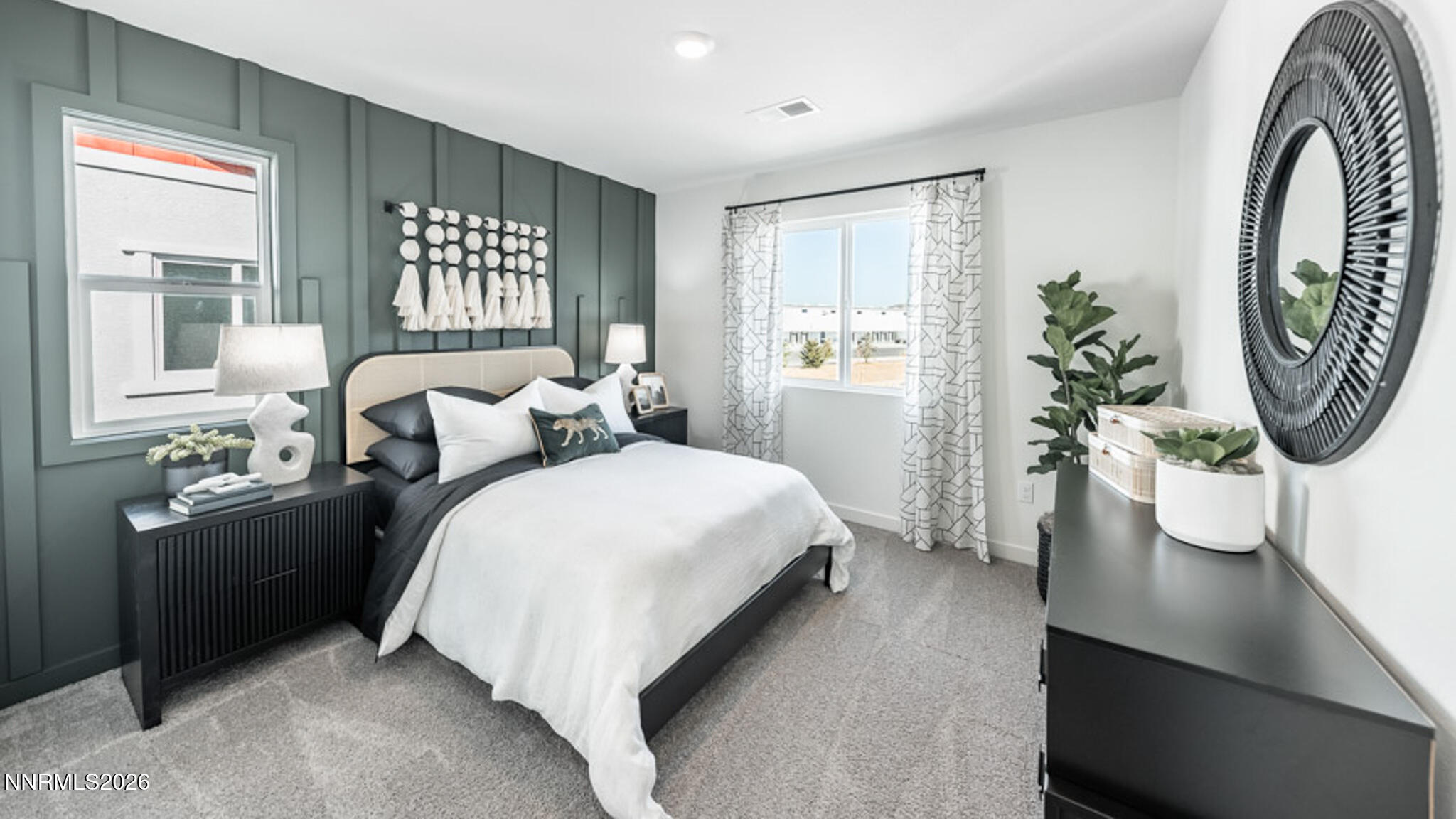 8387 Vermilion Drive Reno, NV 89506 - Photo 12 of 16 a bedroom with a bed mirror and window