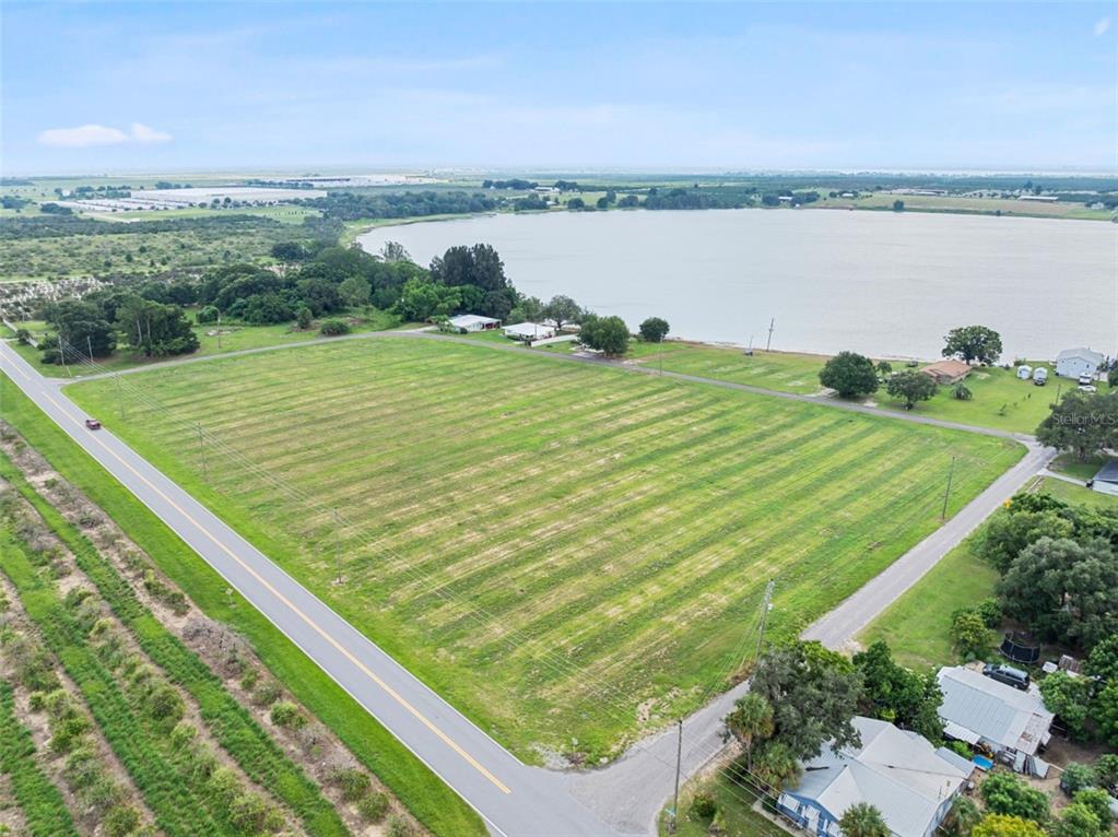 Fort Meade Road Frostproof, FL 33843 - Photo 3 of 10 a view of a lake with outdoor space
