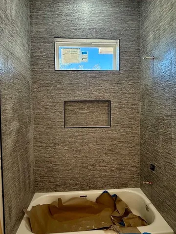 a bathroom with a sink and a bathtub