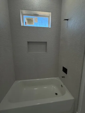 a bathroom with a bathtub