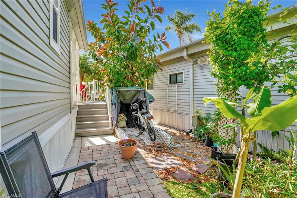 10709 Roseate Spoonbill Circle Estero, FL 33928 - Photo 21 of 32 a view of outdoor space yard and patio