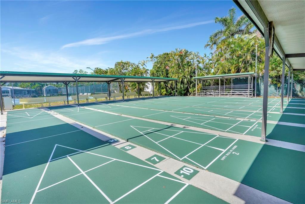 10709 Roseate Spoonbill Circle Estero, FL 33928 - Photo 25 of 32 a view of a tennis court